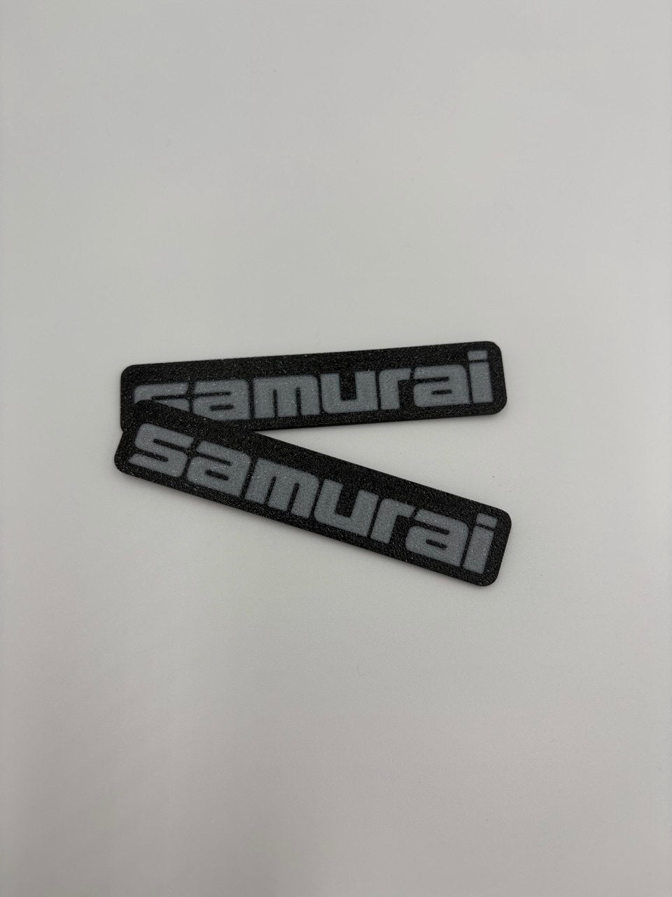 Coppia (2) di targhette laterali per Suzuki Samurai