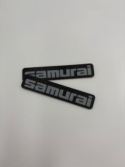 Coppia (2) di targhette laterali per Suzuki Samurai