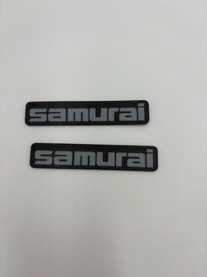 Coppia (2) di targhette laterali per Suzuki Samurai