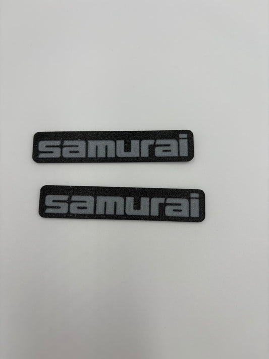 Coppia (2) di targhette laterali per Suzuki Samurai