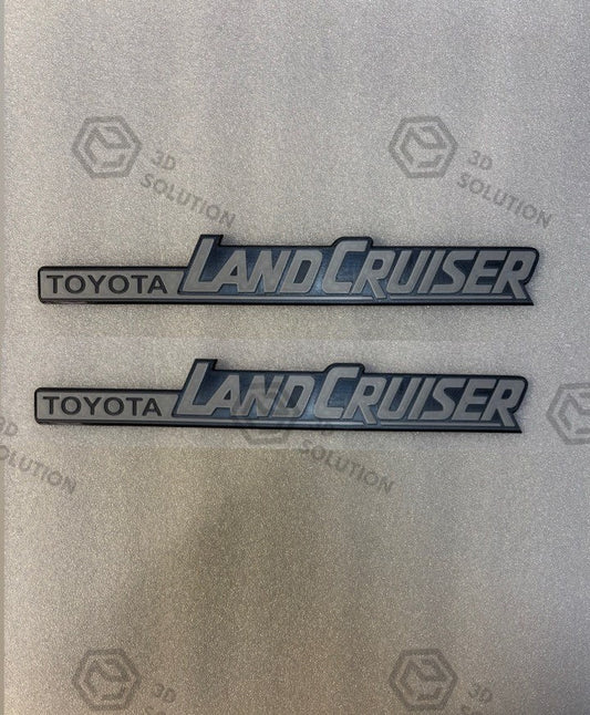 Replica coppia scritte laterali parafango "LAND CRUISER" per Toyota Land Cruiser LJ70